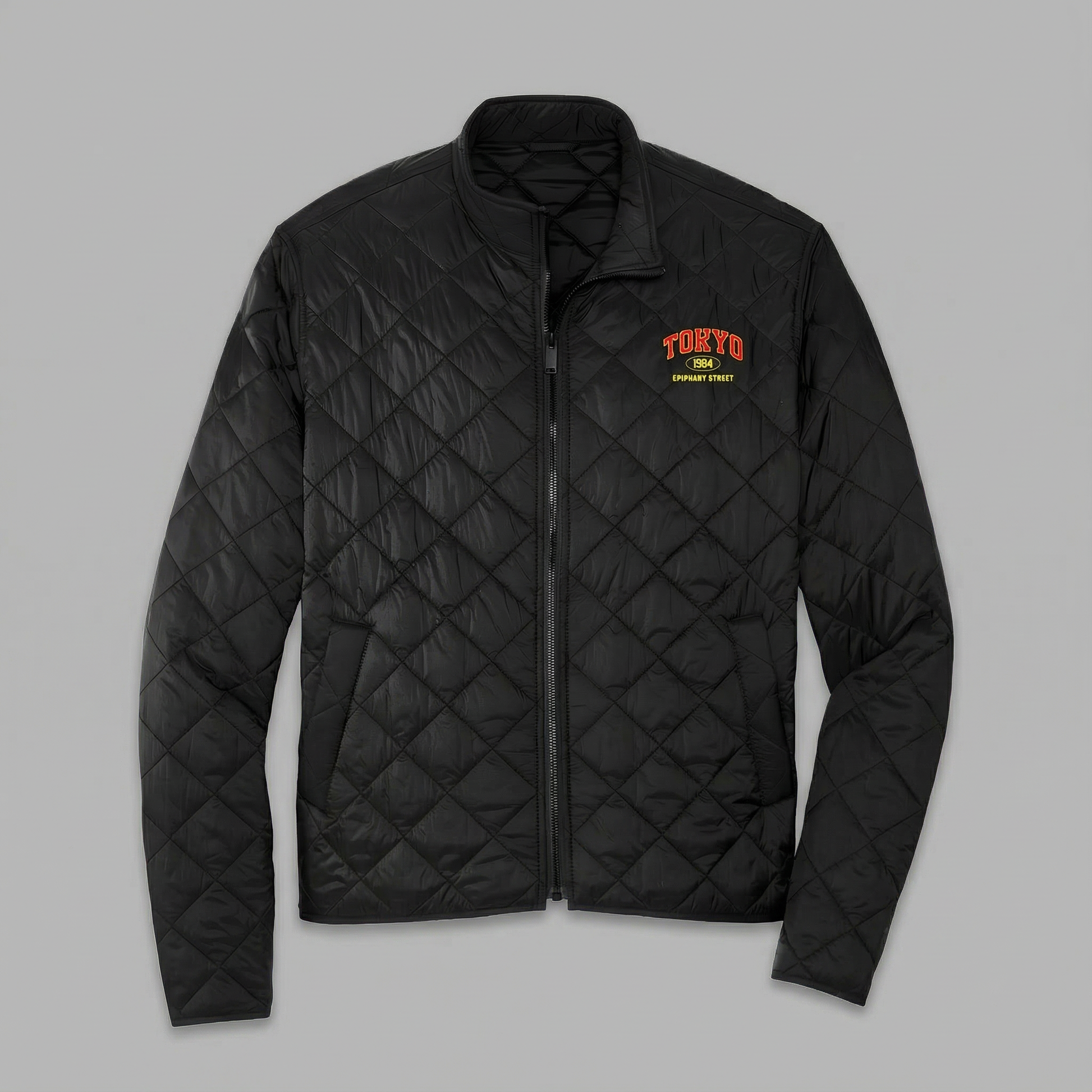 Black quilted jacket with 'Tokyo' logo on a gray background
